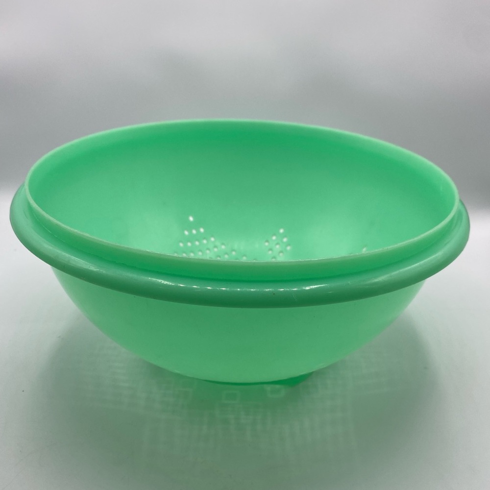 Teal green light blue Tupperware sifter , stainer, pasta
